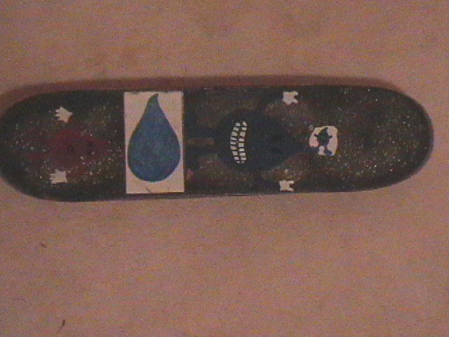 This marked the first board that I would put my friend's picture on.  When that didn't work out, I covered it up with paint markers, so starting my career of painting my decks' griptapes.